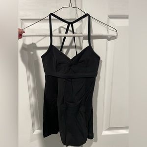 Lulu lemon strappy black workout top with shelf bra. Size 2.